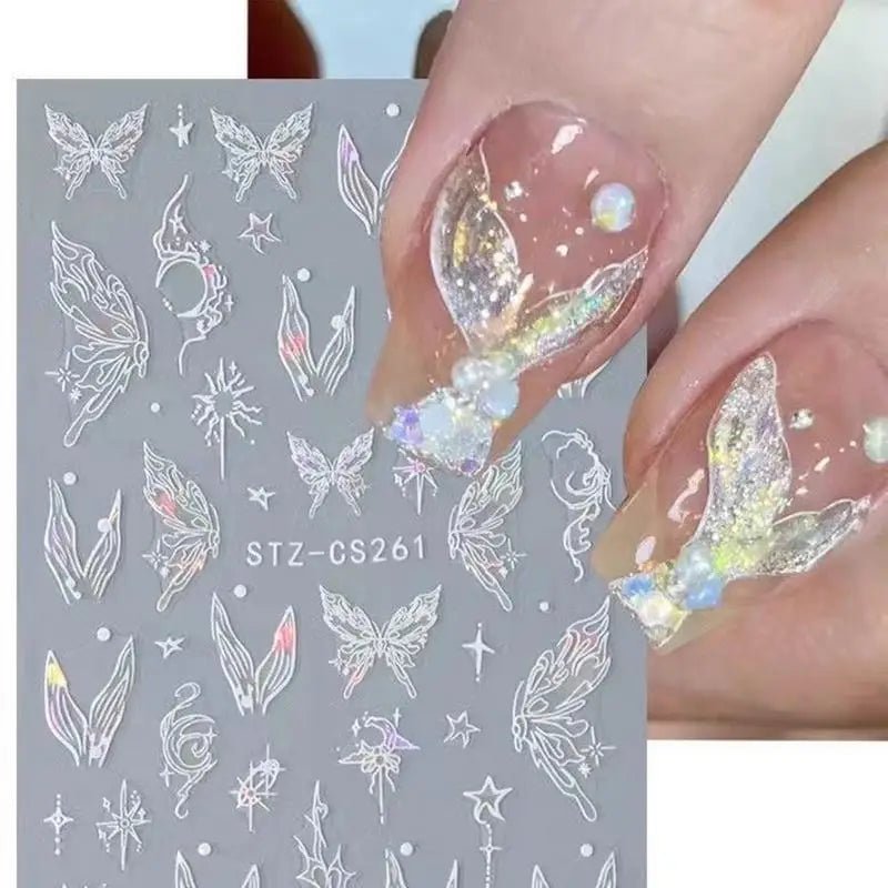 Luxury nails with Hailey Bieber nails design using nail art supplies featuring butterfly stickers and glitter