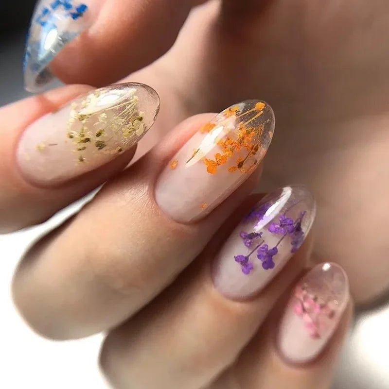 Luxury nails with colorful flower nail art supplies inspired by Hailey Bieber nails