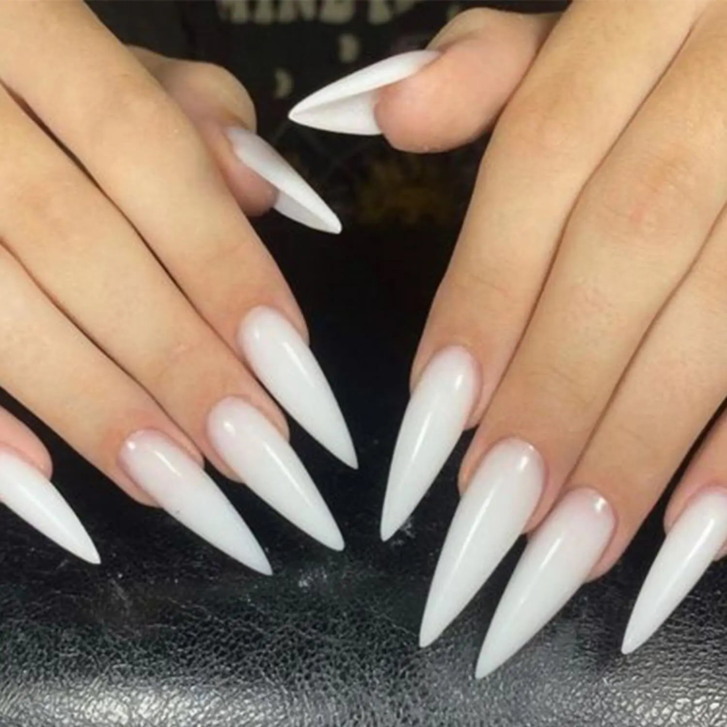 Luxury nails in a sharp stiletto design, inspired by Hailey Bieber nails, ideal for nail art supplies