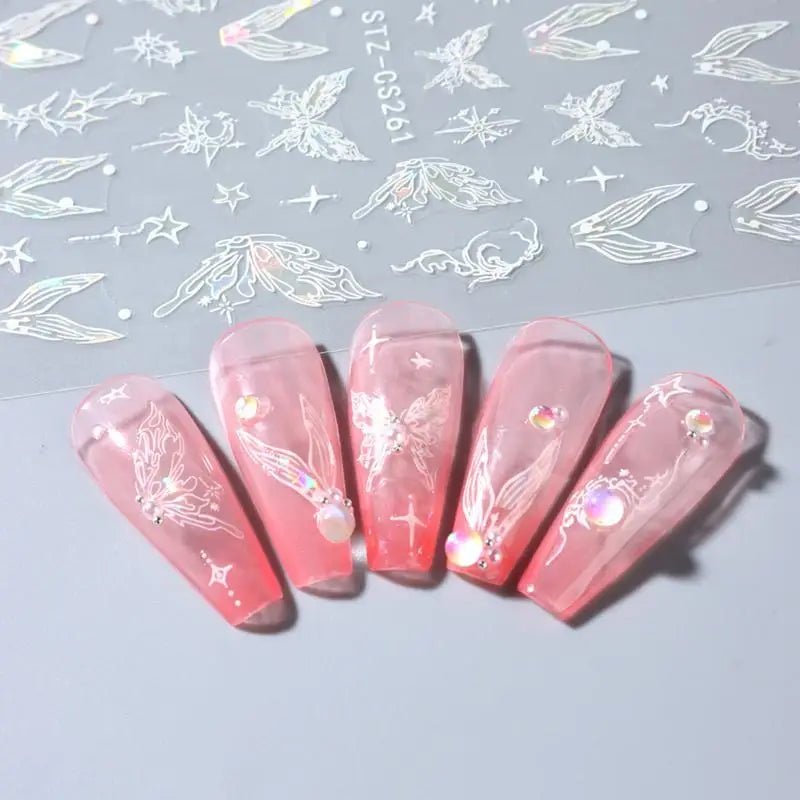 Luxury nails inspired by Hailey Bieber nails featuring nail art supplies and intricate designs