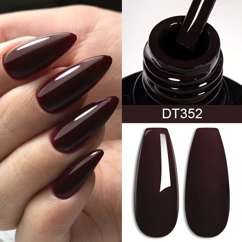 Luxury nails in deep burgundy inspired by Hailey Bieber, featuring nail art supplies for DIY designs