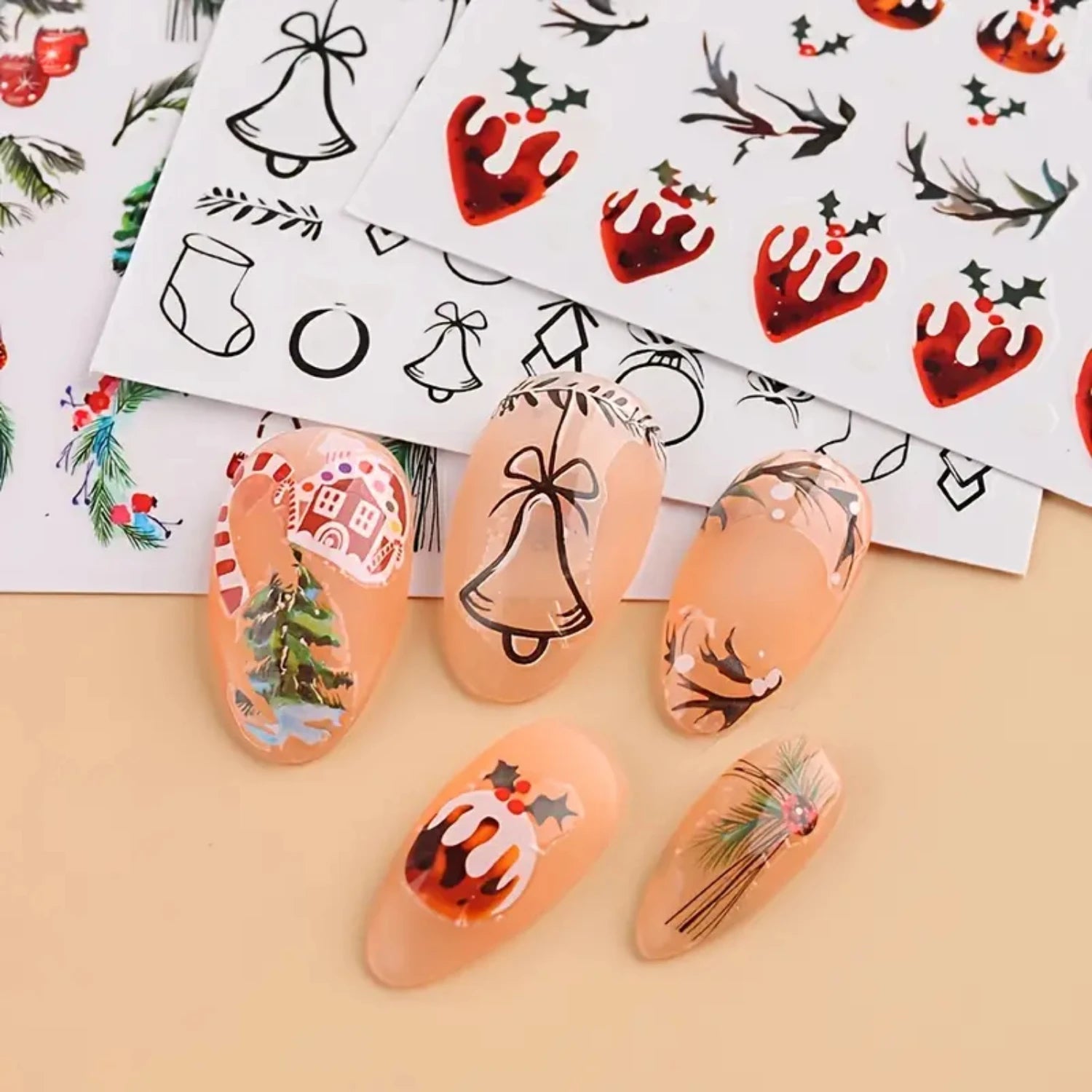 Paola Center nail art supplies featuring festive Christmas designs and decorative stickers