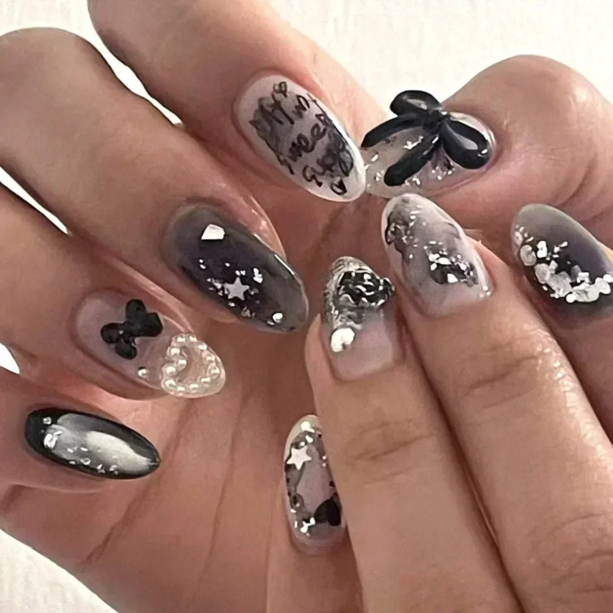 24Pcs False Nails Spicy Girl Silver Bow with Diamond Fake Nails with Glue Almond Press on Nails Black Cool Y2k Almond Nail Set - Paola Center