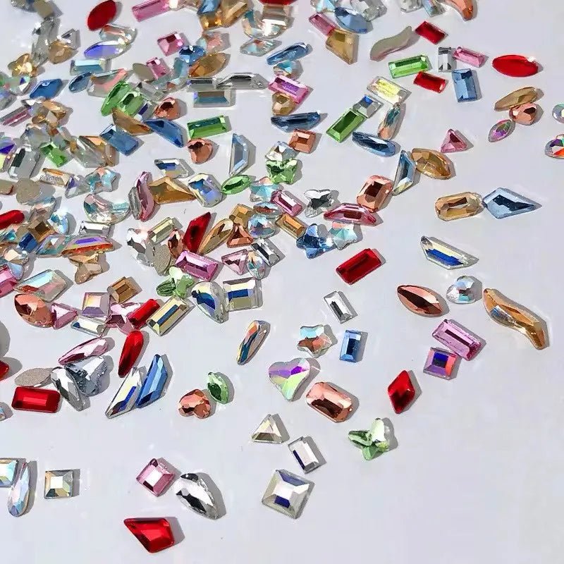 Colorful assortment of shiny gemstones for DIY luxury nail accessories set from Paola Center