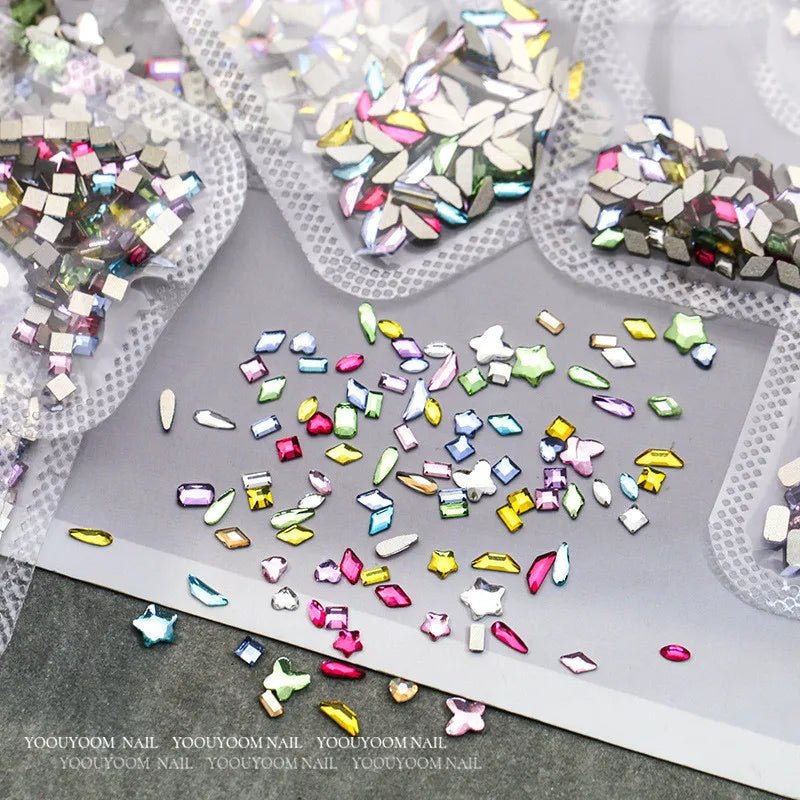 Colorful shiny rhinestones and gems for nails from DIY luxury nail accessories set by Paola Center
