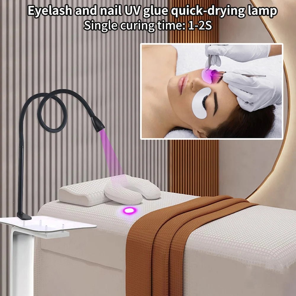 Luxury nails drying under a quick-drying UV lamp designed for fancy nails with a flexible arm for easy positioning